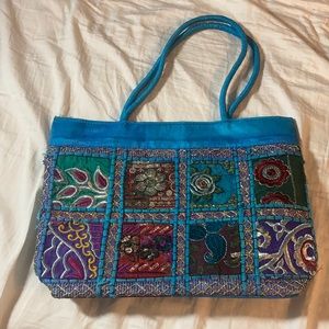 Hand-stitched hand-beaded handmade artisan bag